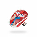 A computer mouse with a colorful geometric fox pattern in red, blue, beige, and white, still inside a clear plastic protective wrapper, placed on a dark wood-grain surface.